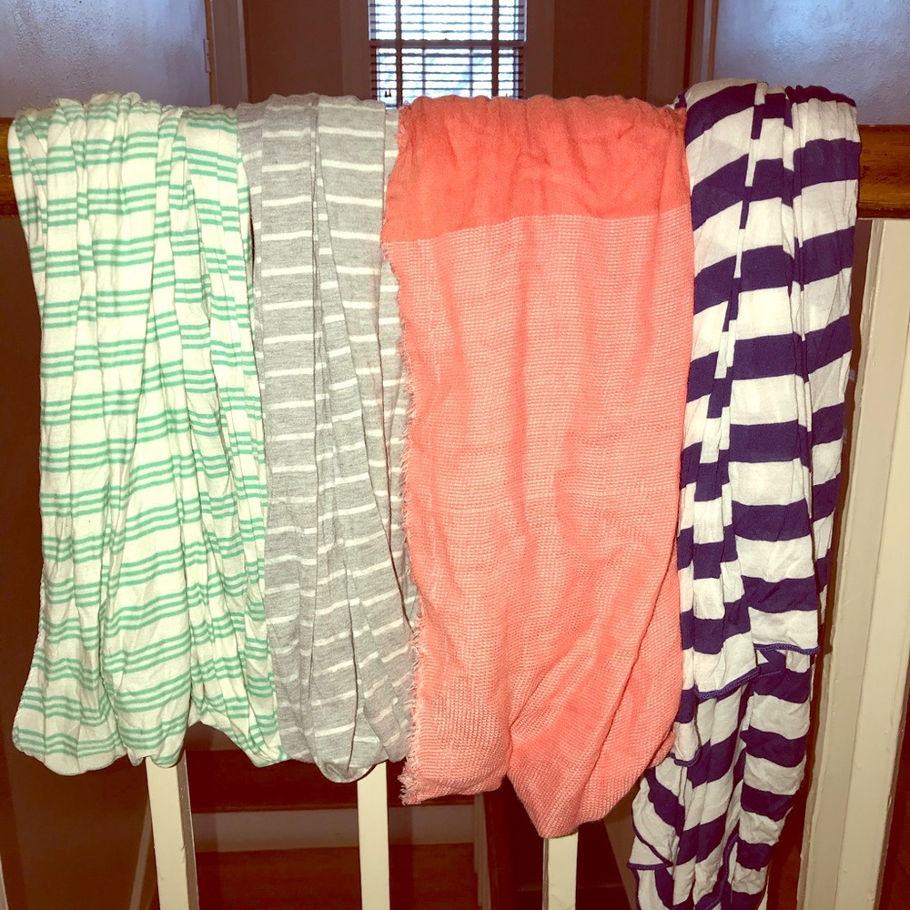 4 scarves. 3 on the left are infinity scarves.